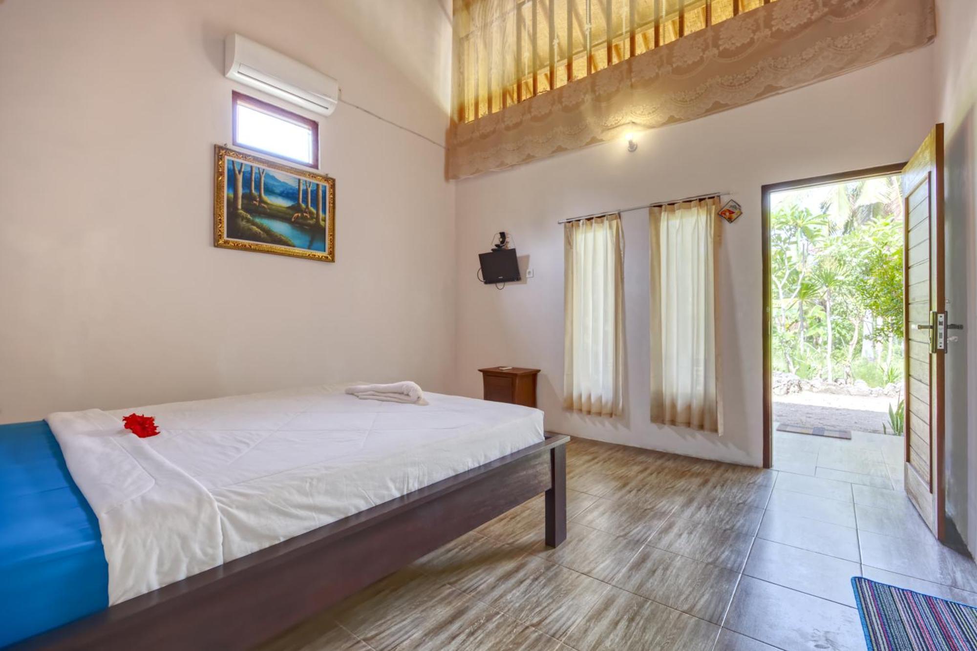 Misa Guest House Sakti Rum bild